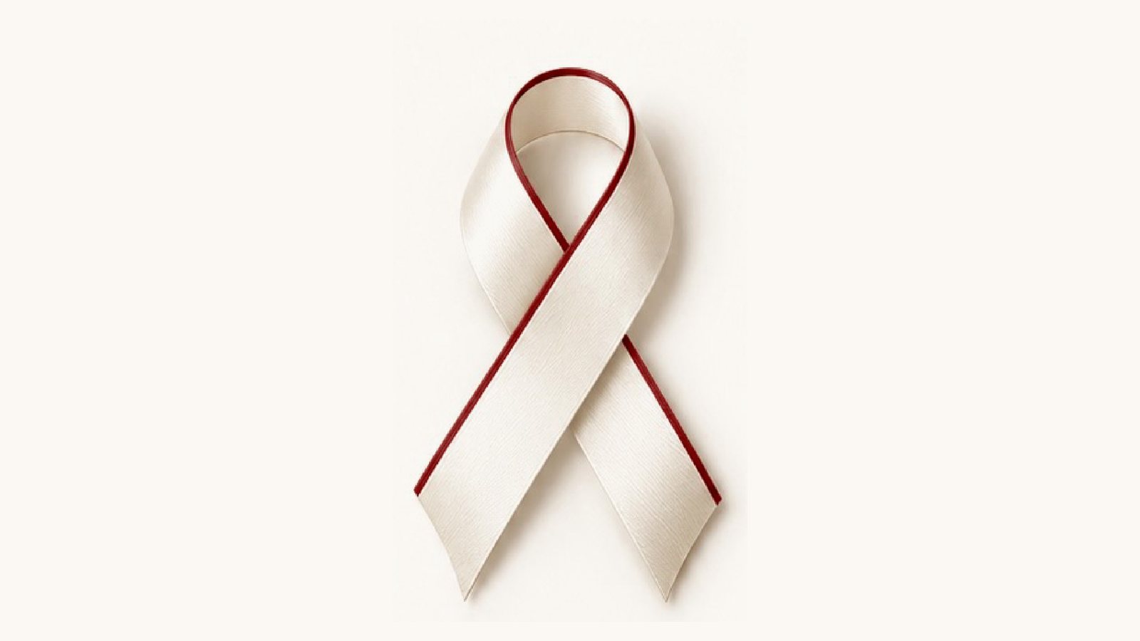 Ivory satin awareness ribbon edged in red